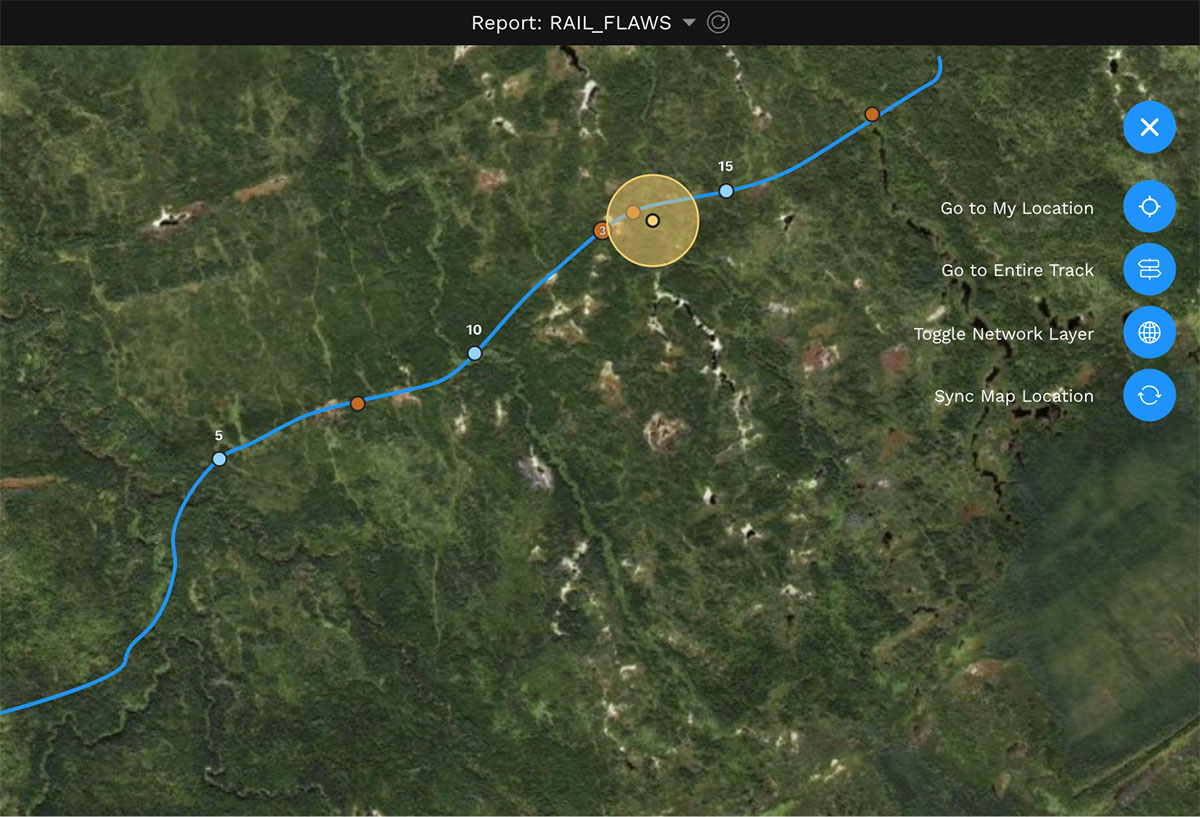 A tablet-sized screenshot showing a map view with the rail line and GPS position shown against a background of satellite imagery. Several controls are visible in the top right corner.